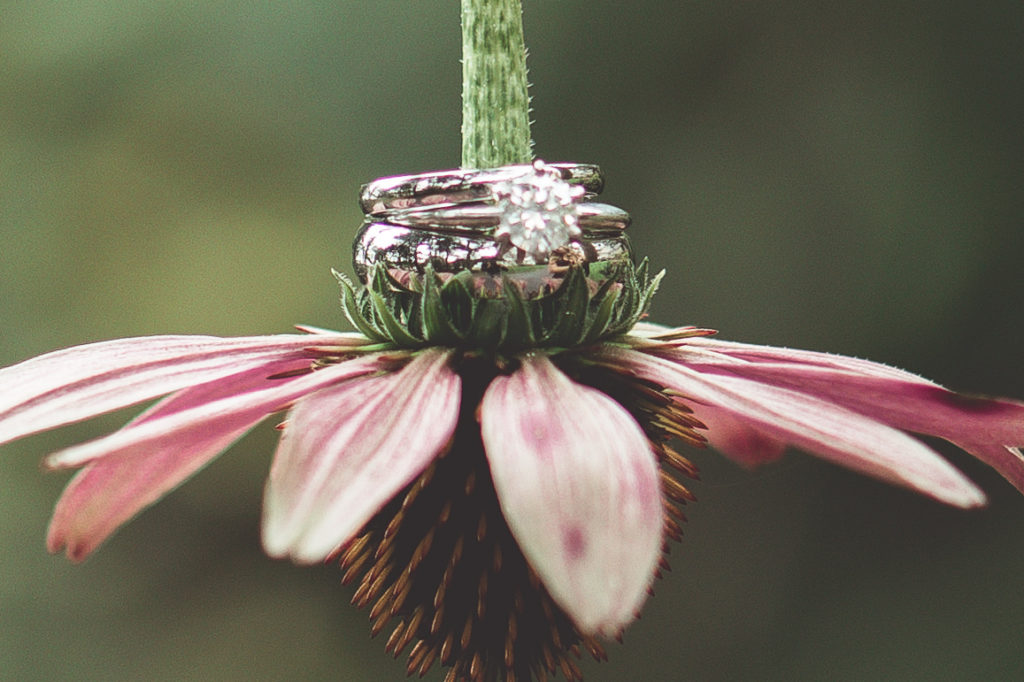 flower and wedding ring photo idea detail shot